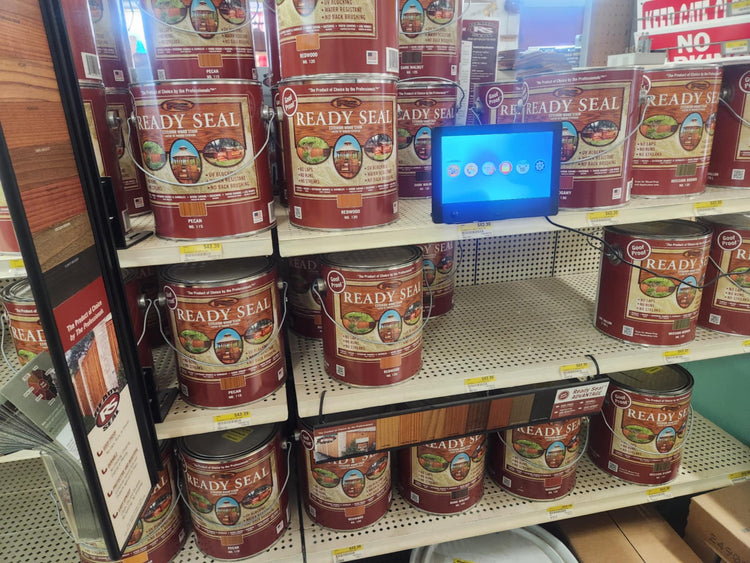 Paint, stain and supplies on display inside of Luther Hardware & Lumber.